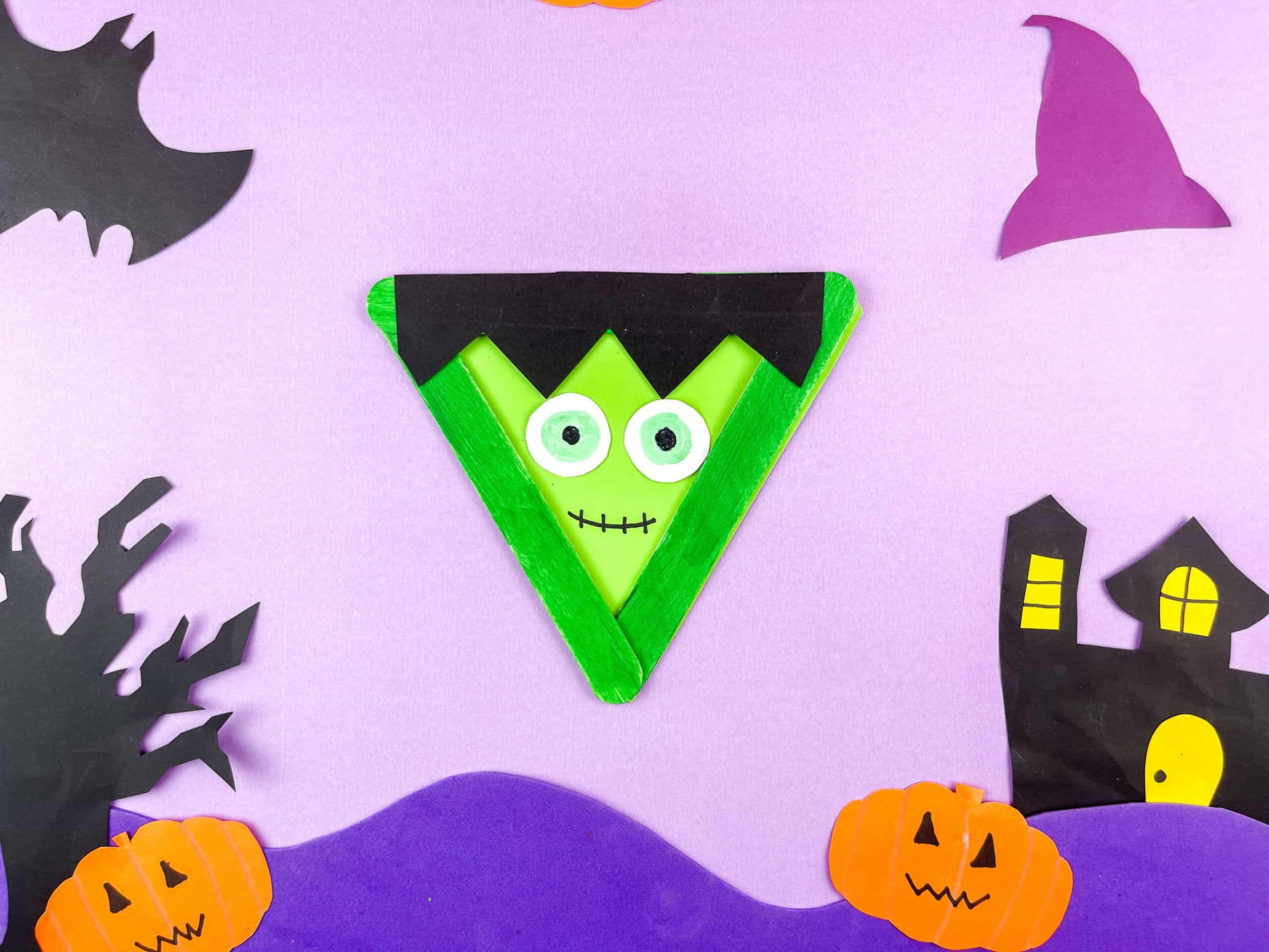 Overhead shot of a frankenstein popsicle stick craft for kids