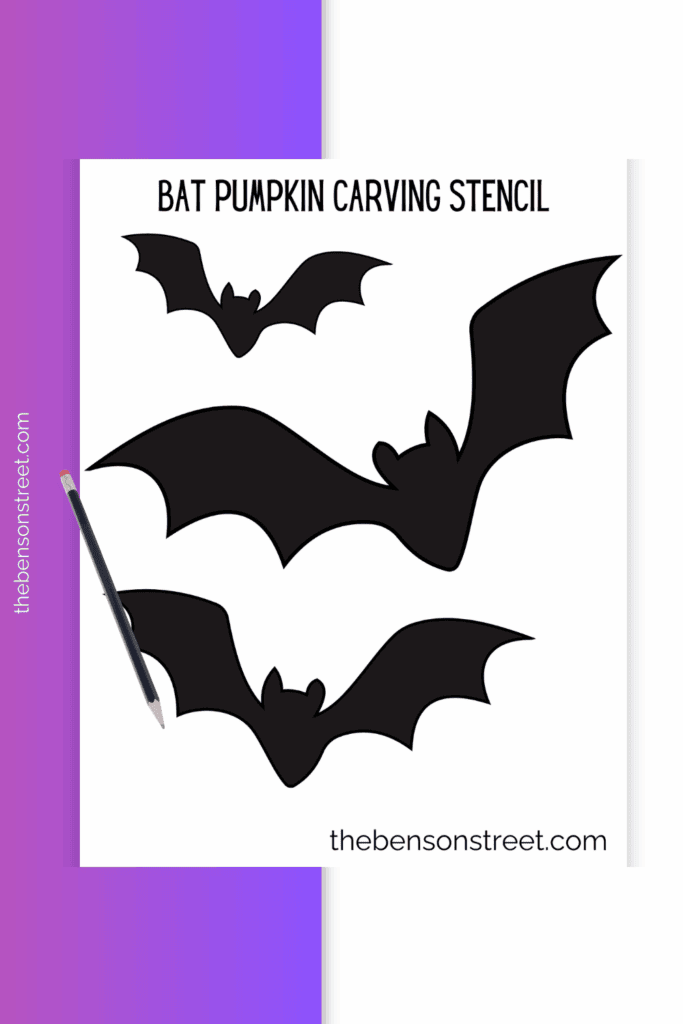 Sheet of paper with black bats on it for carving onto a pumpkin for a bat jack o'lantern