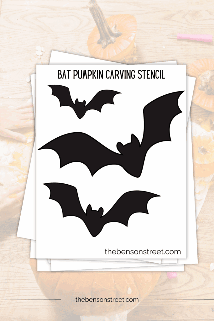 Simple bat silhouettes for carving a pumpkin on a printed out sheet of paper