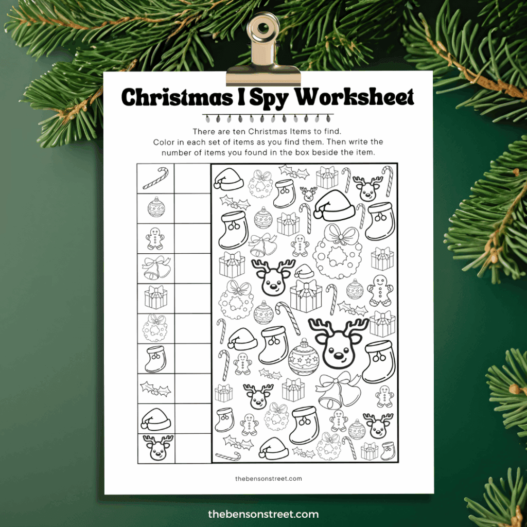 Christmas ISpy Worksheet Coloring page on a clipboard