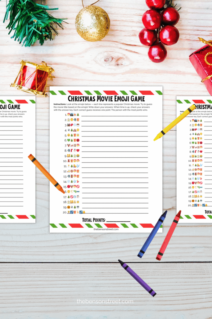 Flat lay of printed sheets of a christmas emoji game
