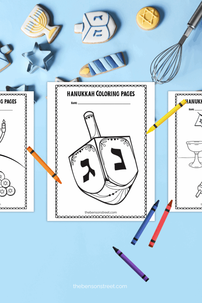 Free printable hanukkah coloring pages with crayons laying on top