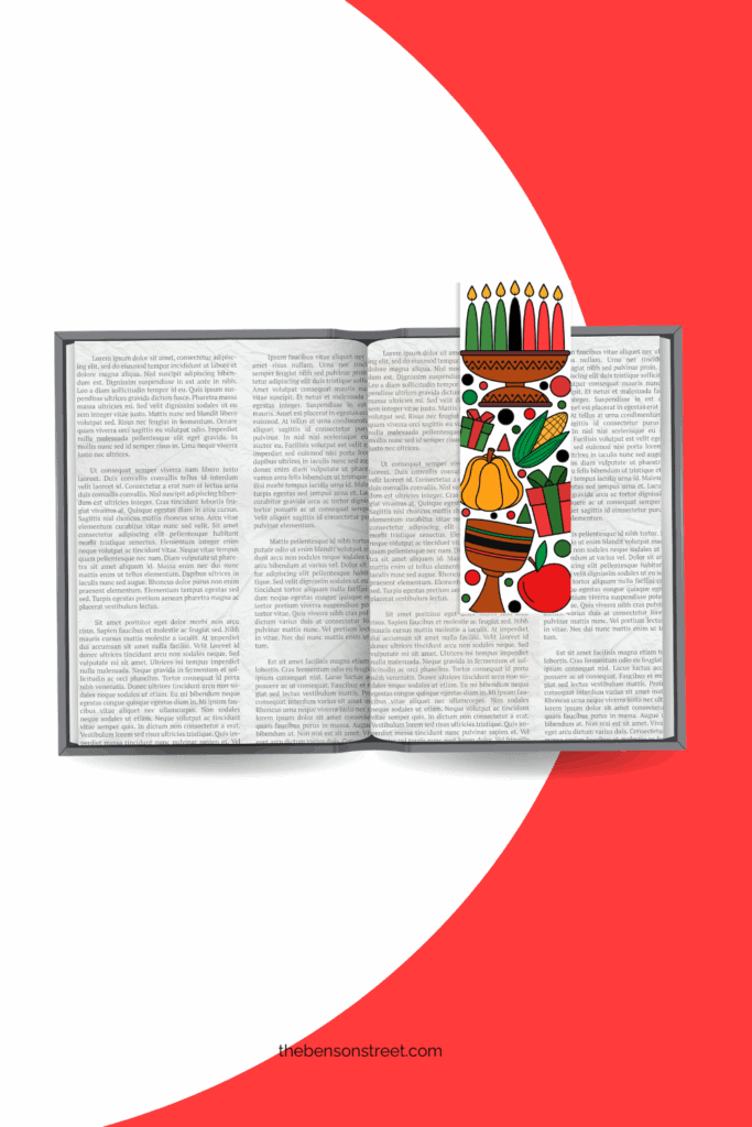 An opened book with a colored in kwanzaa bookmark laying on top of it