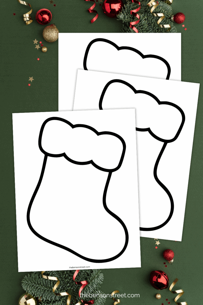 Three sheets of stocking templates printed out on paper