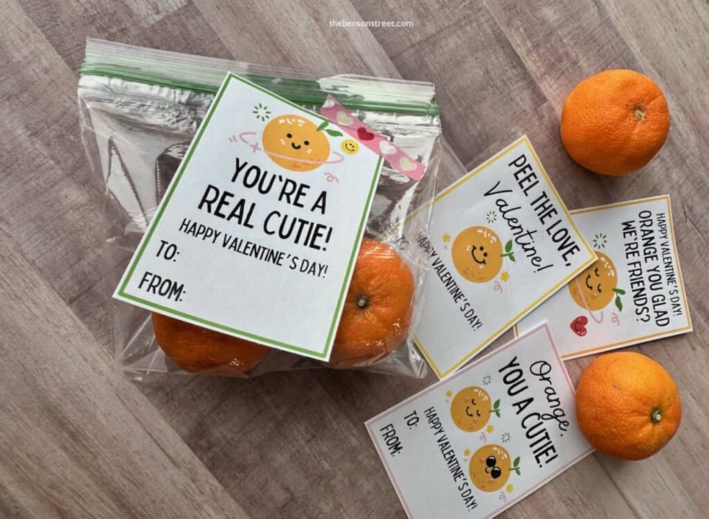 A bag with two cutie oranges and a cutie valentine tag 