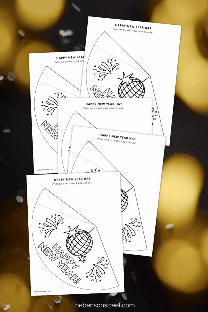 Five printed out sheets of Happy New Year Hats to color in and make