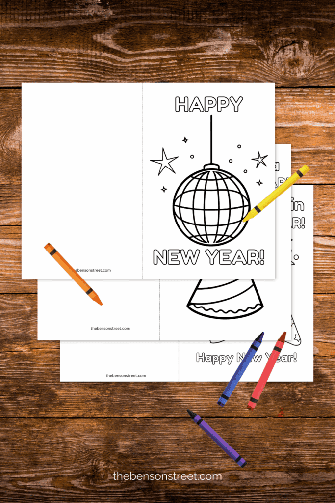 New Year Coloring cards activity free to print on a table with crayons