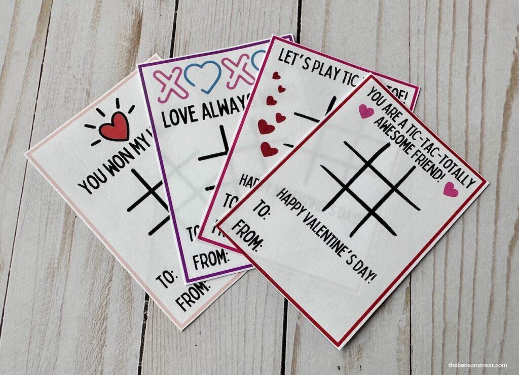 four cut out valentine cards in a fanned out stack