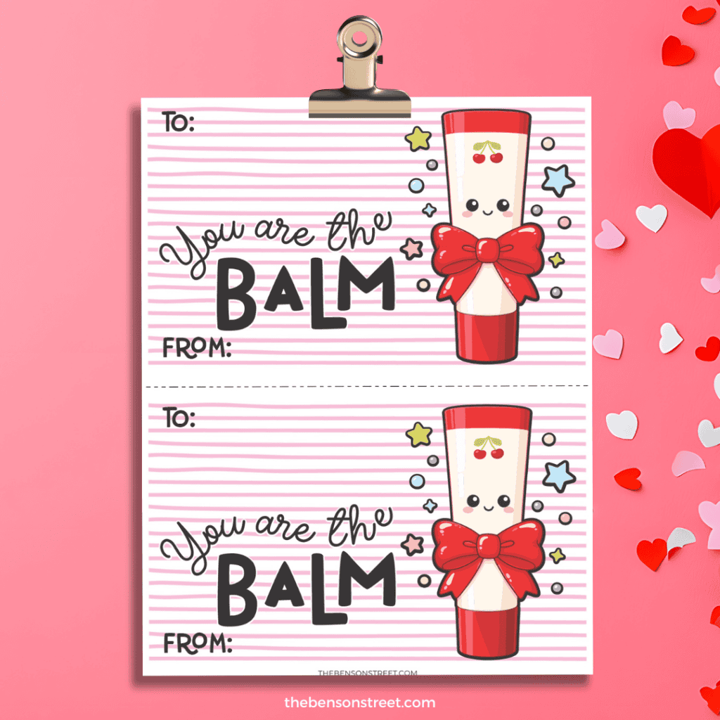 Clipboard with two you are the balm lip balm valentine cards on it