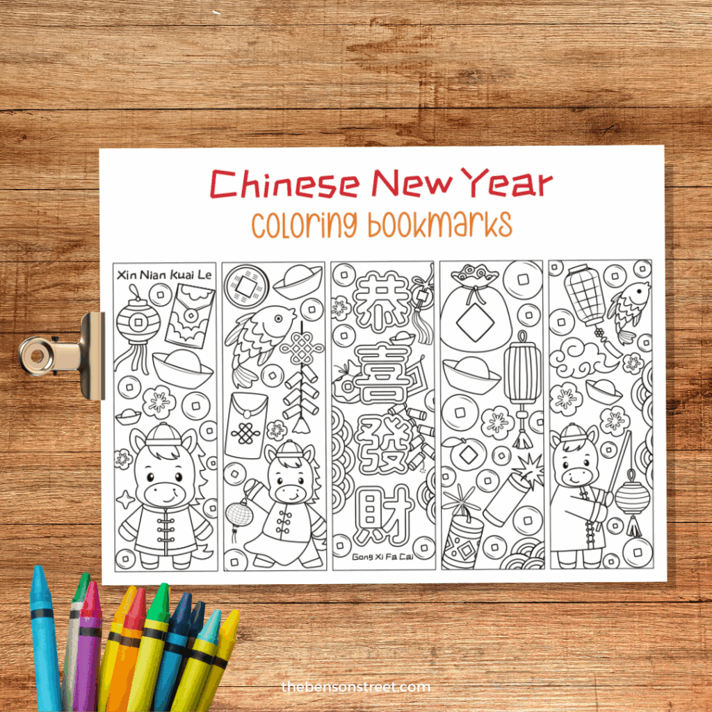 Color your own Chinese New Year bookmark on a clipboard with crayons by it