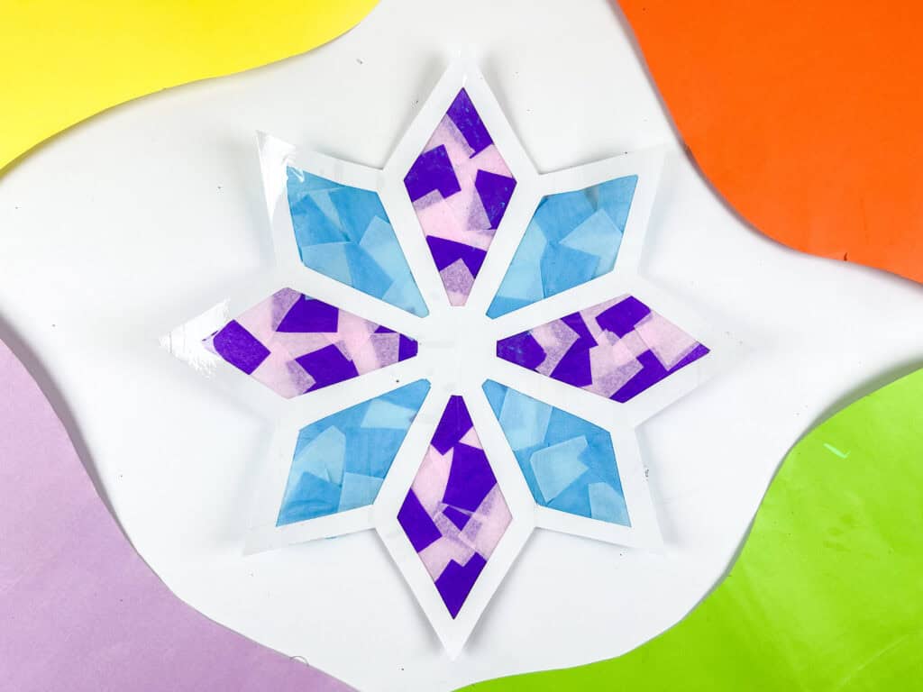 Finished snowflake style stained glass craft for kids