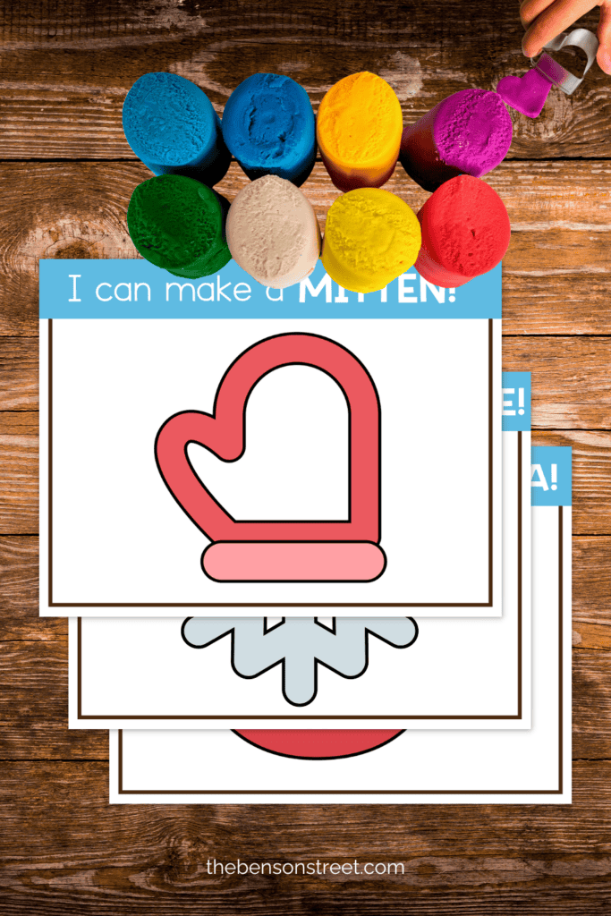 Playdough with winter activity mats on a wooden table