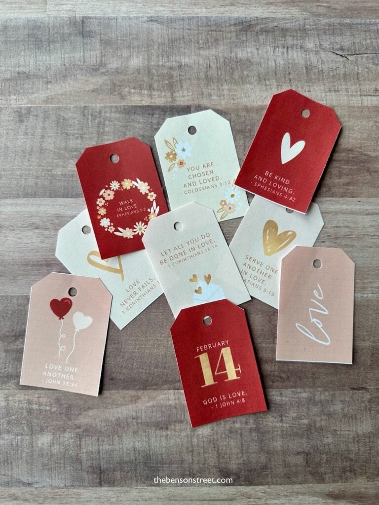Scripture Valentine Tags Cut out laying on a table