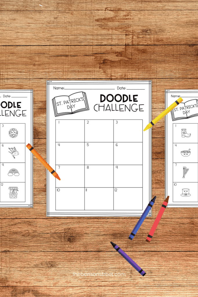 Three pages on a table with crayons laying around it and boxes for drawing items in