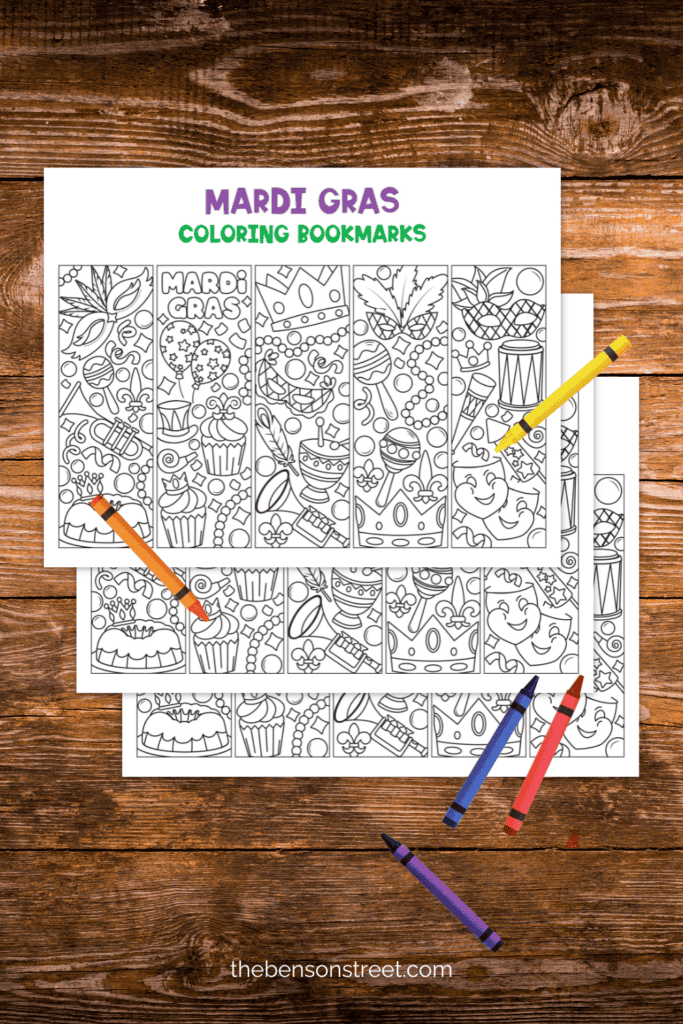 Three sheets of coloring bookmarks for the mardi gras holiday with crayons laying around