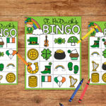 Bingo cards for March on a table with crayons laying around for marking off
