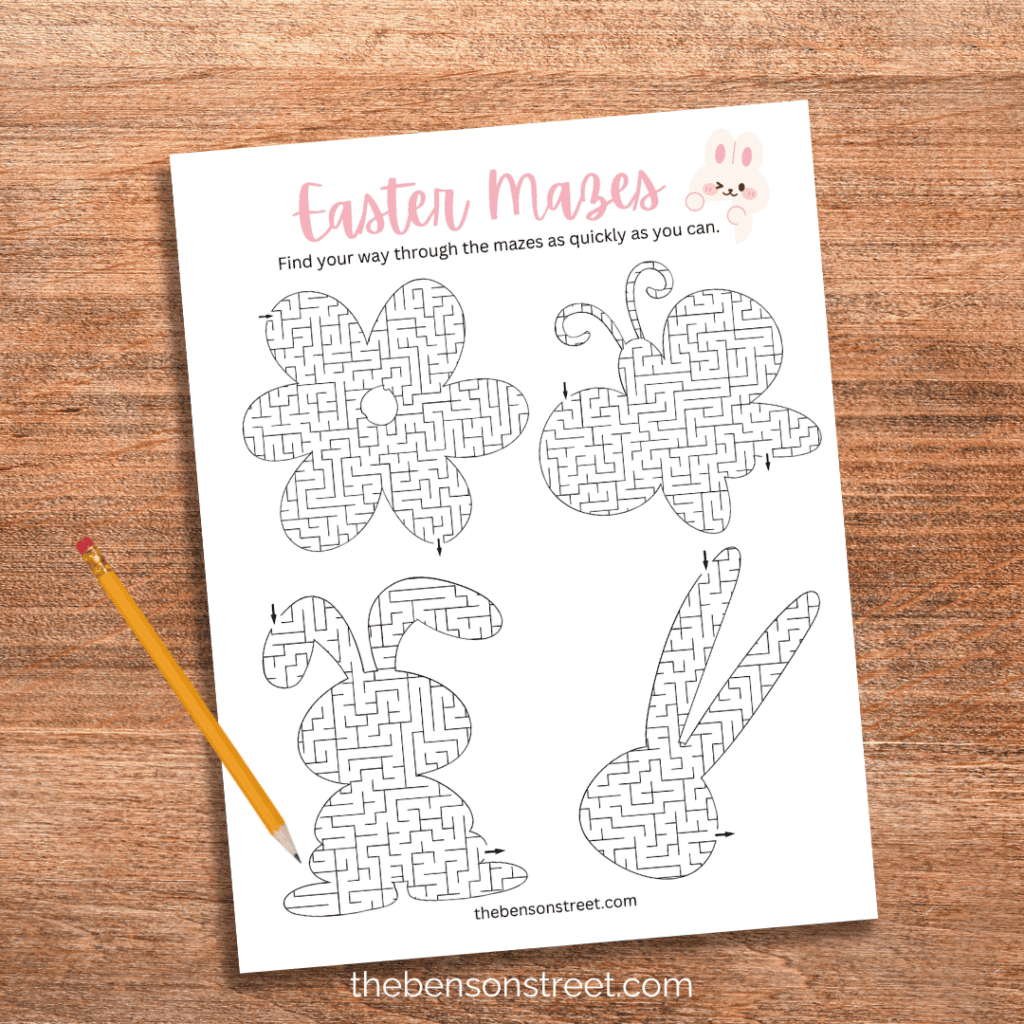 Free Printable Easter Mazes sheet for kids on a wood background 