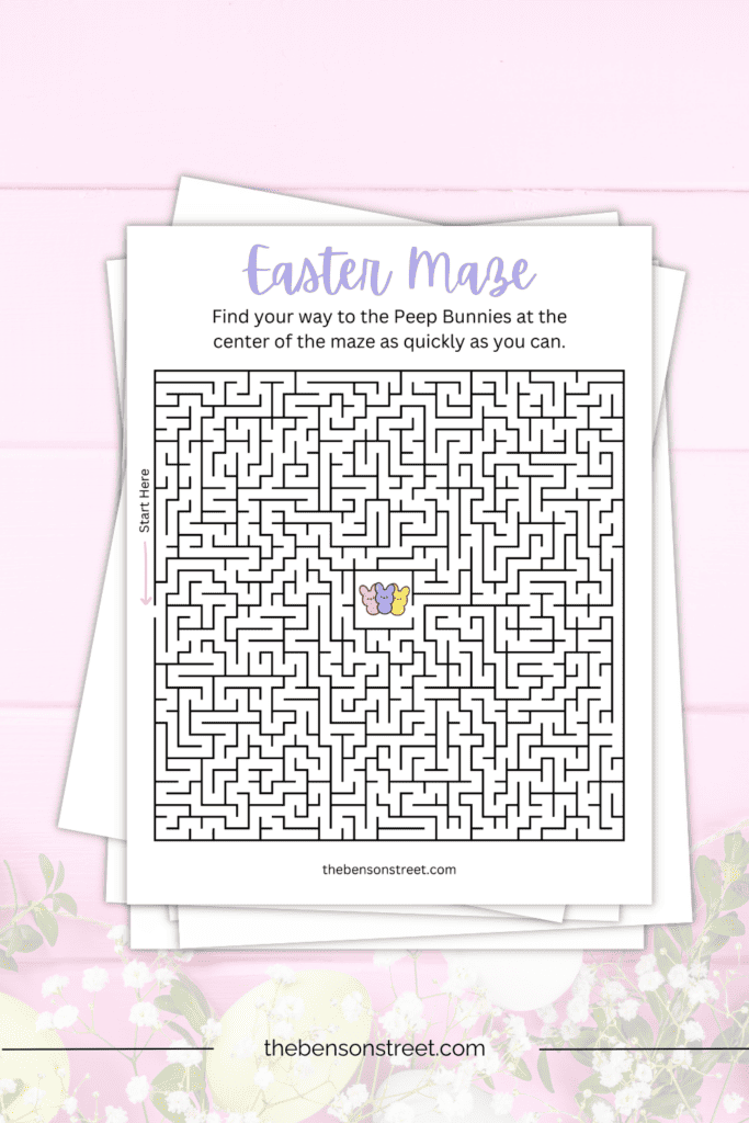 Free printable Peep Bunny Easter Maze sheet on a stack of papers at thebensonstreet.com