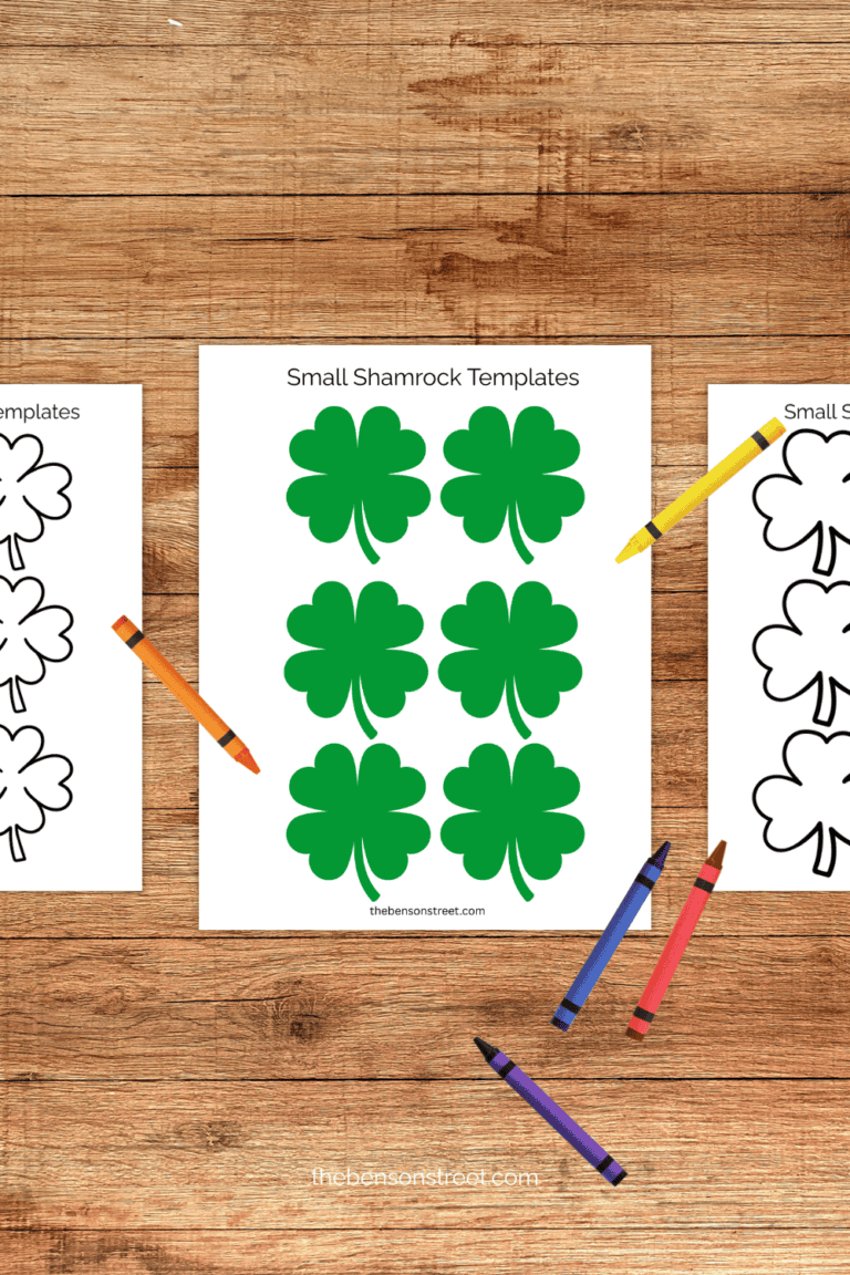 Shamrock clover templates on a table with crayons laying around