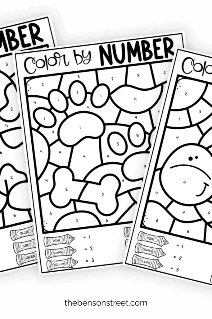 Three sheets of color by number pages free to print in a fanned out stack