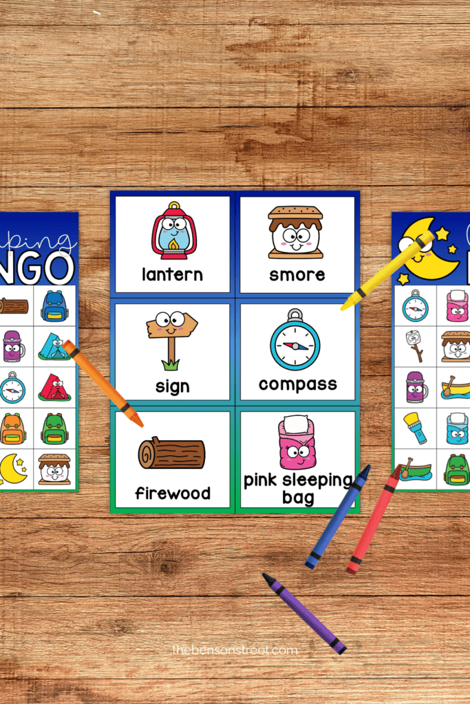Camping bingo printables on a table with crayons laying around