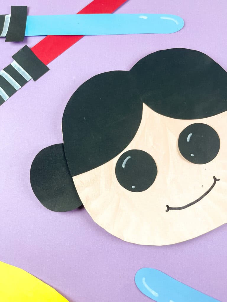 Up close side view shot of a finished paper plate leia organa craft