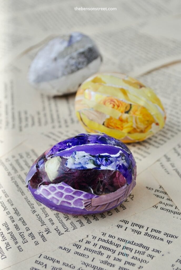 Upclose side shot of three easter eggs made with mod podge or decoupage glue