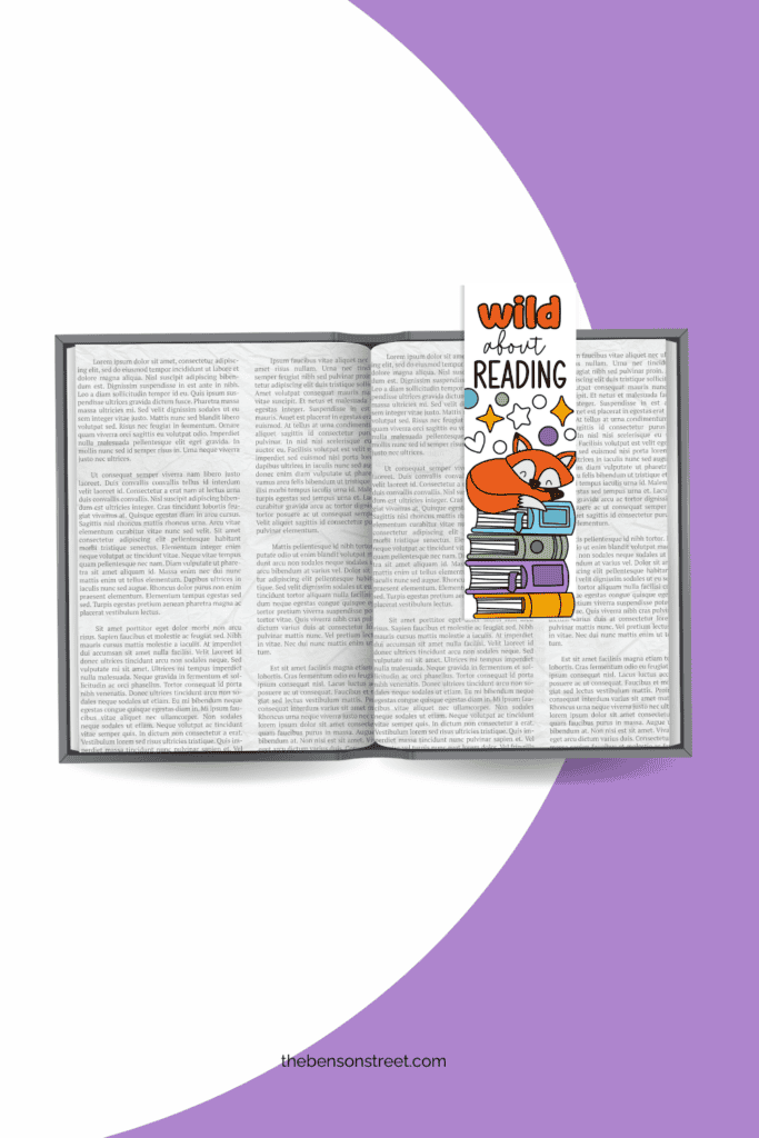 Adorable wild about reading fox bookmark on an open book