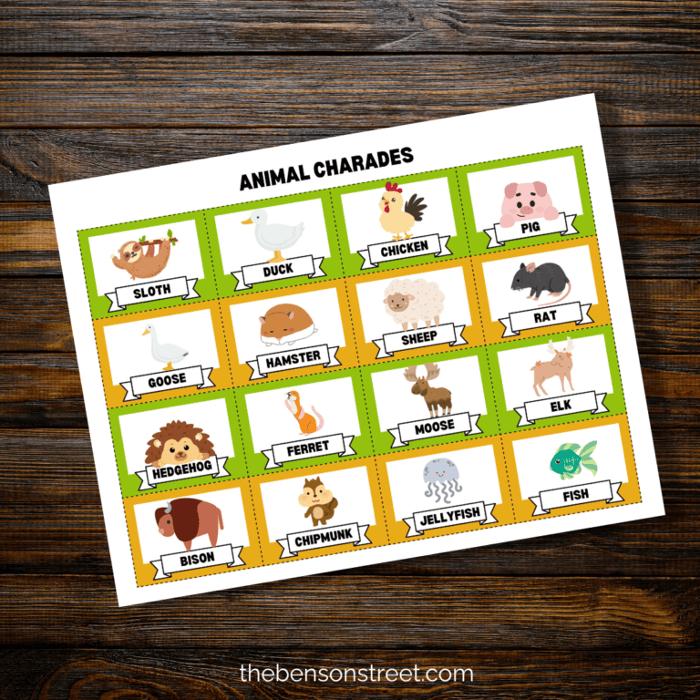 Page of printable animal charades cards on a wood background