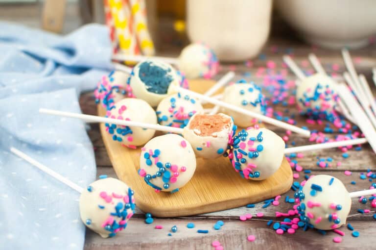 white chocolate dipped cake pops with a surprise inside