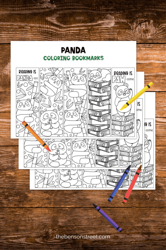 Sheets of coloring bookmarks with crayons around