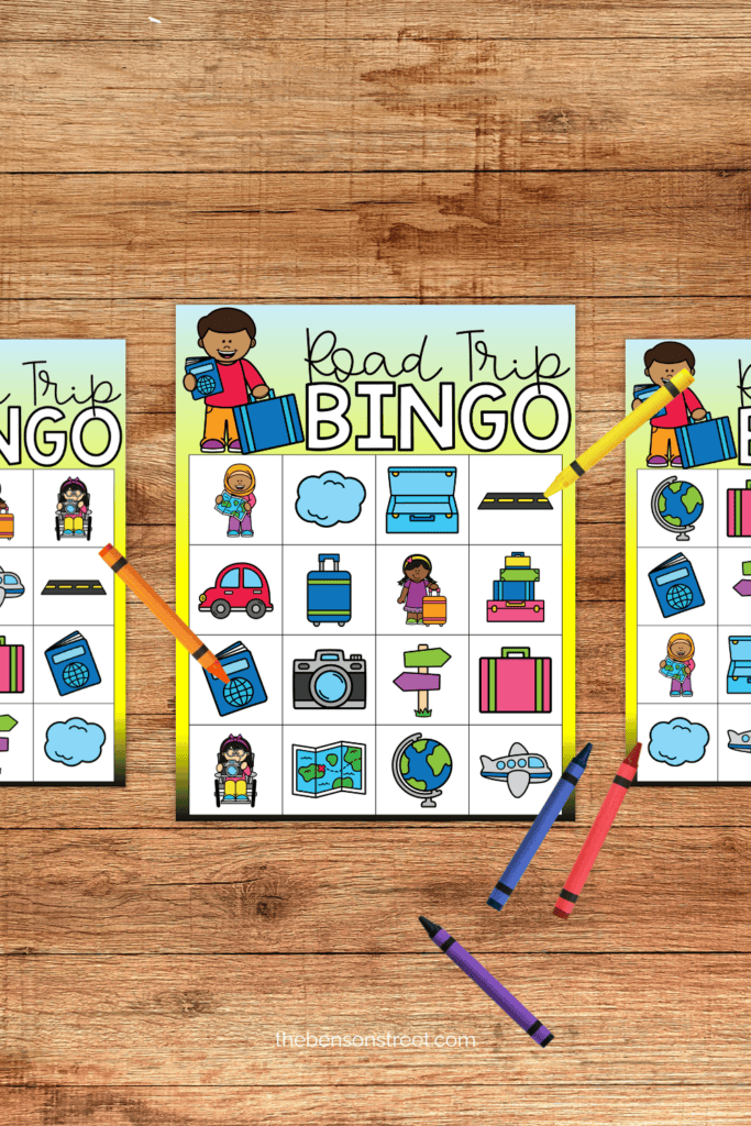 Three bingo boards for a road trip with crayons laying around