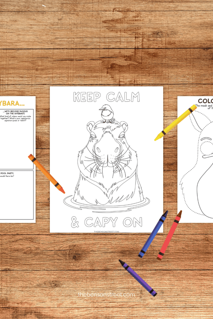 A Table with a capybara coloring page on it and crayons scattered around