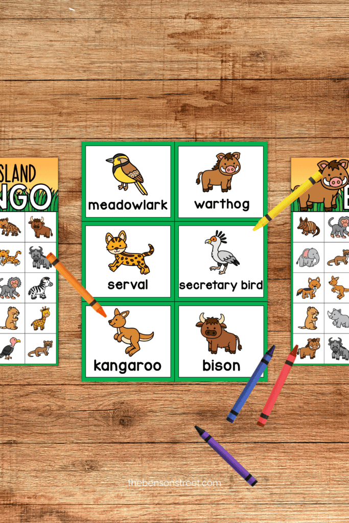 A page of calling cards for grasslands themed bingo with two boards next to it