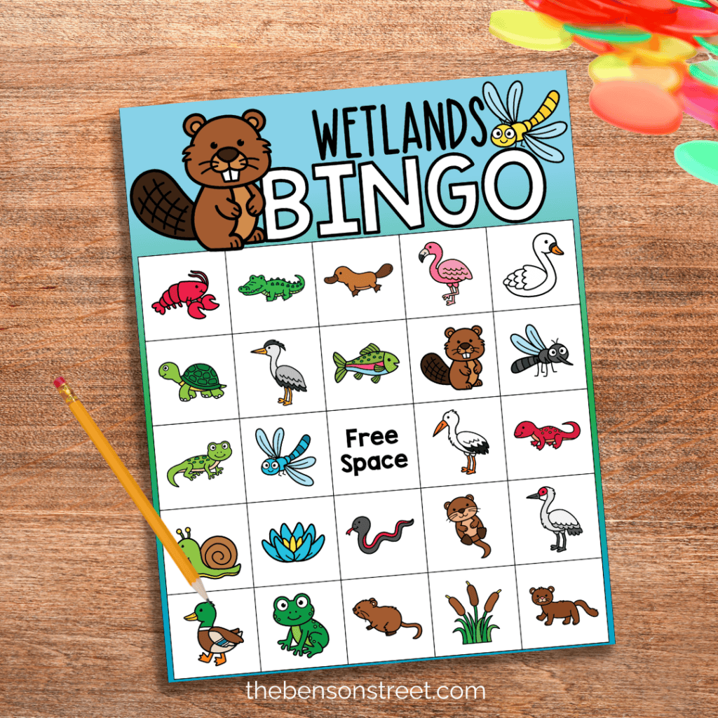 A page of wedland bingo with animals on the squares with bingo chips and a pencil