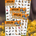 Five woodland bingo boards on a floral background