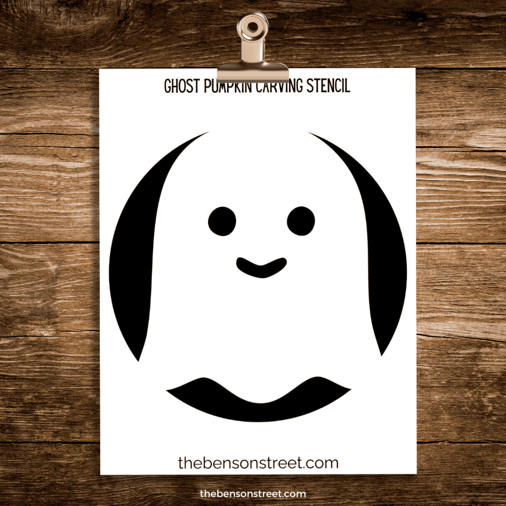 Ghost pumpkin carving stencil with a cute smile page on a clip