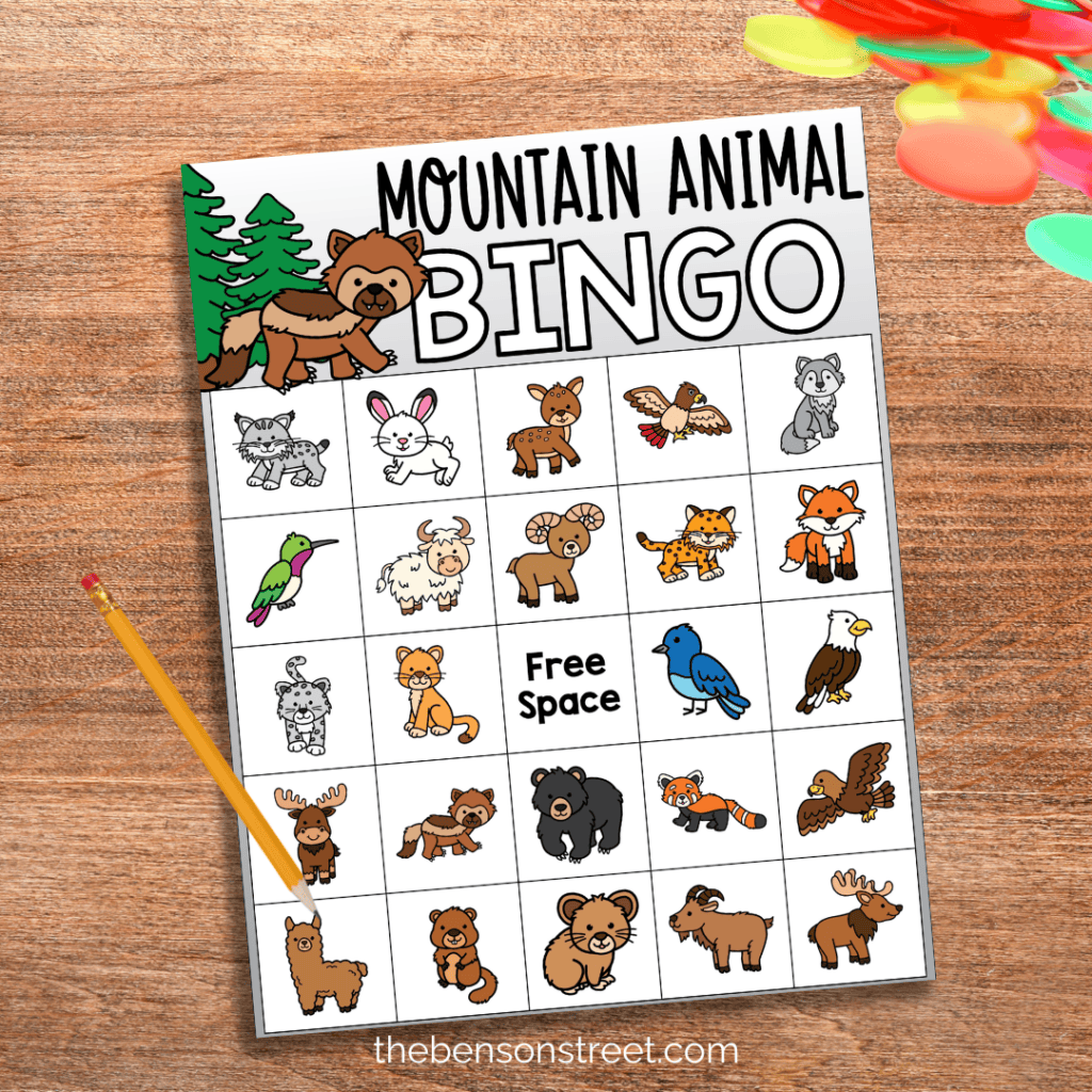 Mountain Animal Bingo Game Board with a pencil and bingo markers