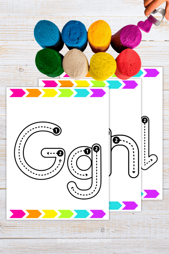 Playdough on top of free printable letter mats for kids