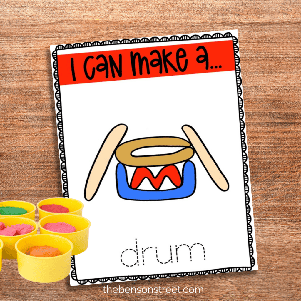 I can make a drum playdough mat with containers of playdough by it