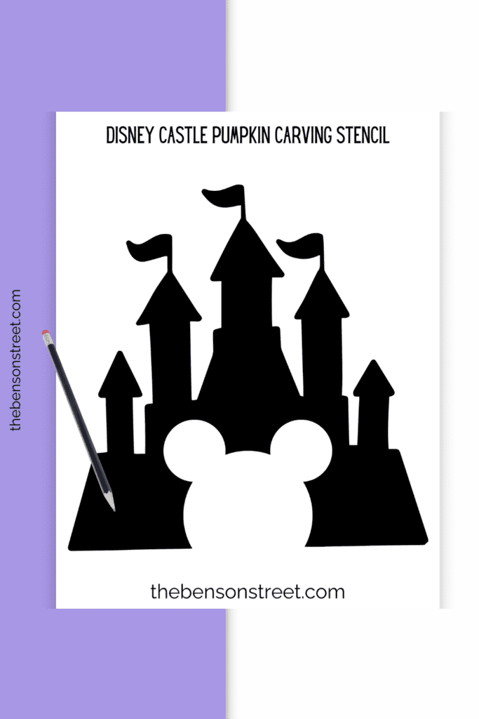 A page with a castle outline on it for carving pumpkins and a pencil on top