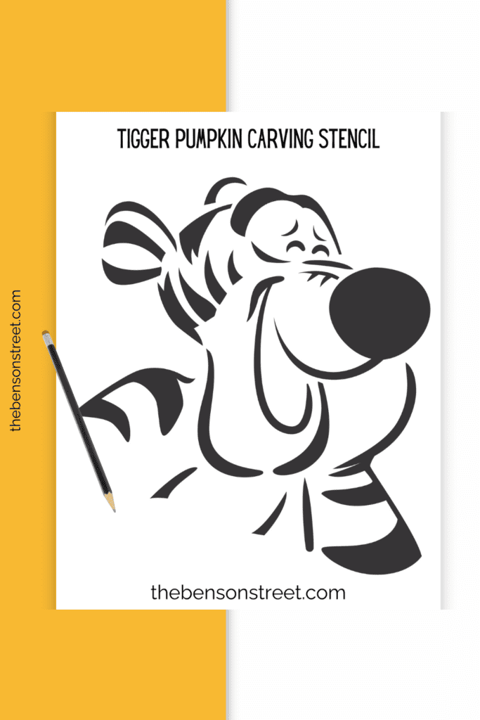 A page with a picture of tigger for a stencil with a pencil laying on top