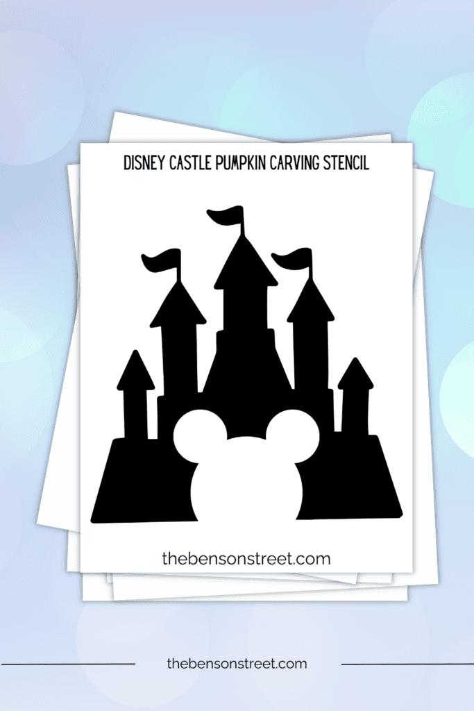 A stack of papers with a Castle featuring Mickey Mouse for carving a Jack O'lantern