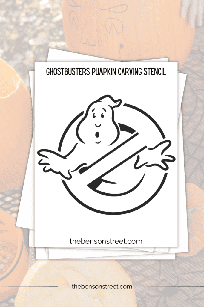 A stack of papers with a Ghostbusters pumpkin carving stencil on top