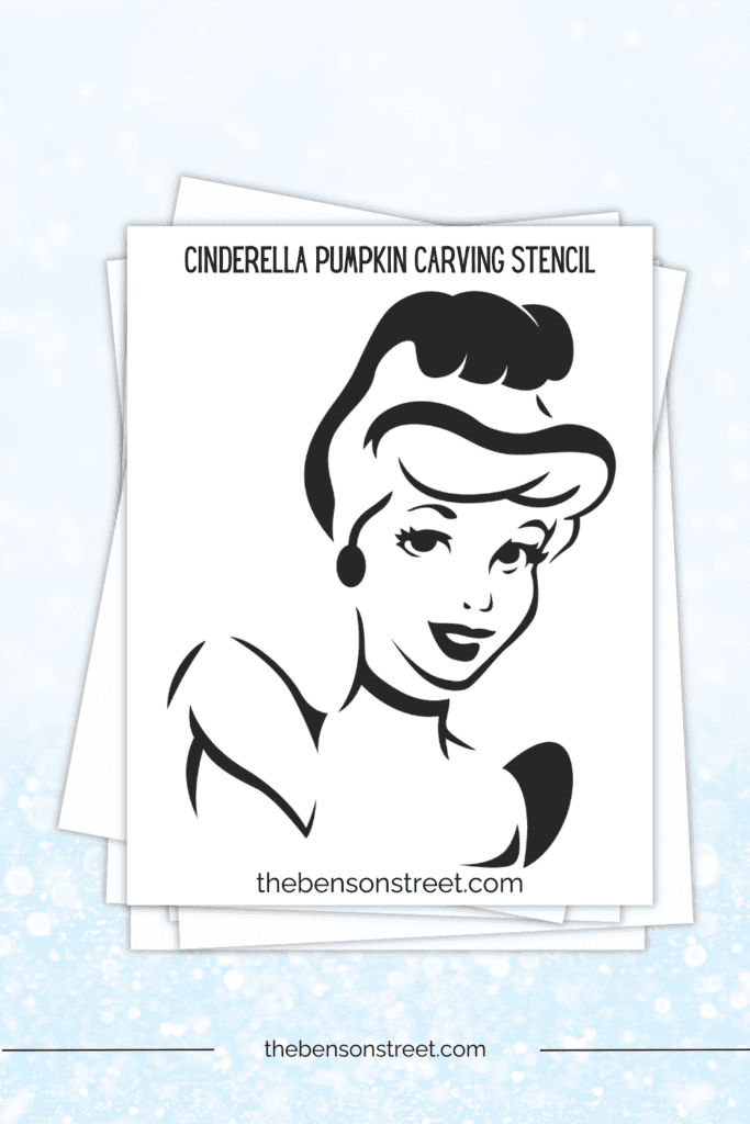 A stack of papers with a printable cinderella page on top