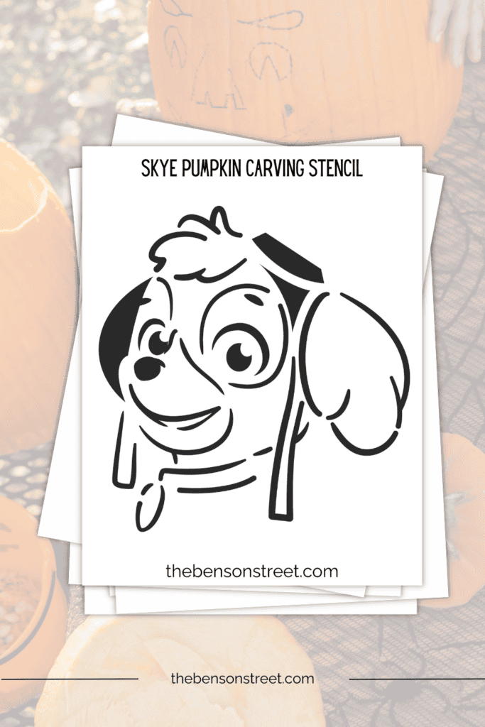 A stack of papers with a skye themed pumpkin carving template on top 