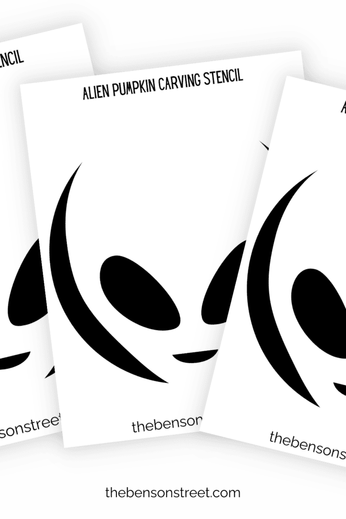 Three free printable pages of an alien pumpkin stencil iin a fanned out stack
