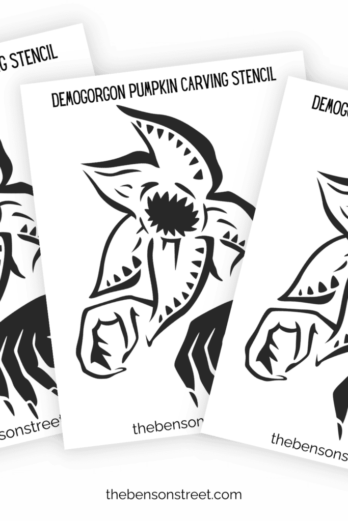 Three sheets of Demogorgon pumpkin stencils in a fanned out stack
